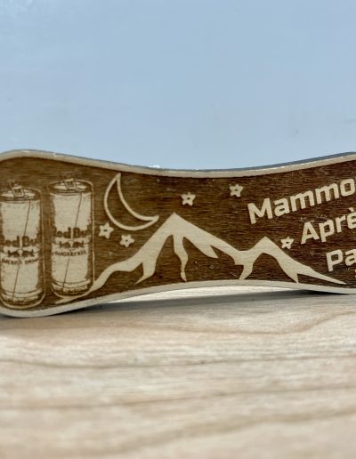 custom shaped wood token snowboard red bull