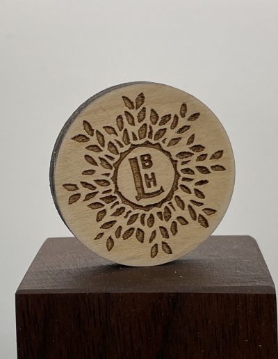 engraved round wood nickel
