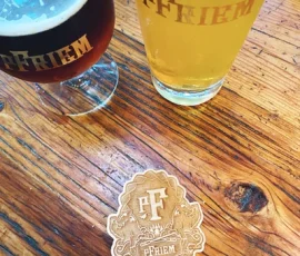 pfriem beer tokens on bar