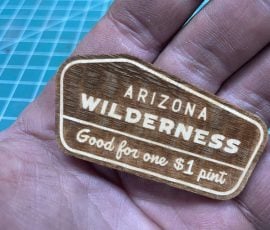 arizona wilderness good for one pint custom wood token | toasted maple