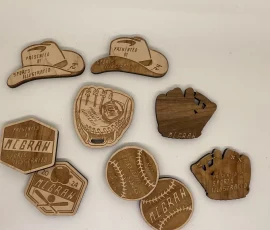 a variety of custom tim mcgraw sro tour tokens