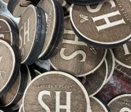 HS lodge and resort custom round wood nickels