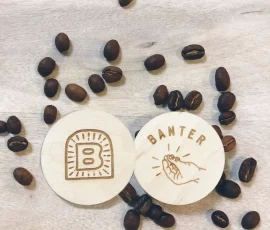 banter coffee round wooden nickels