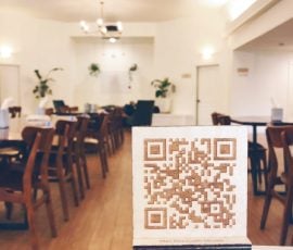 custom wood qr code at restaurant